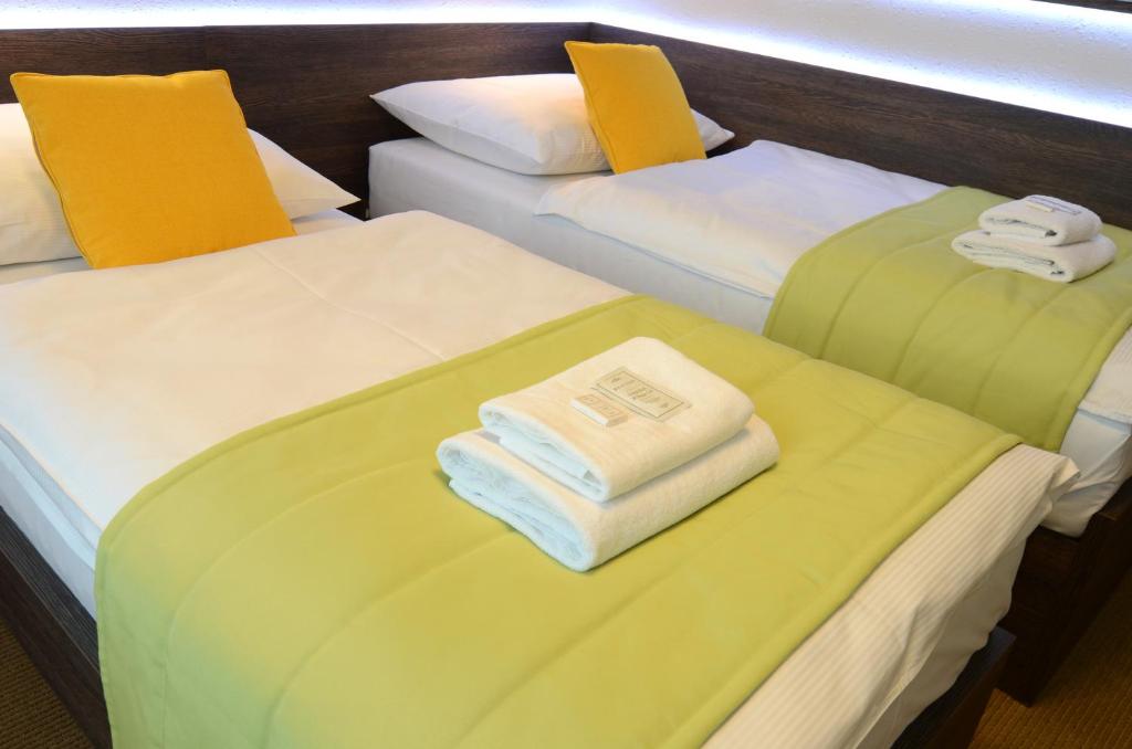 Postel nebo postele na pokoji v ubytování Hotel Uno