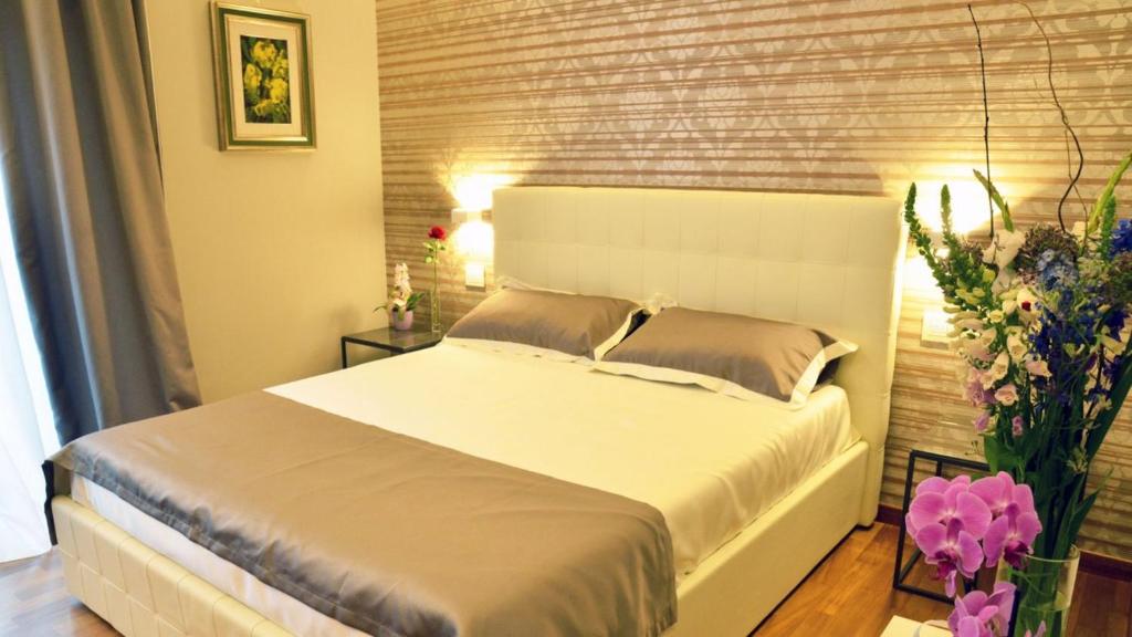 Postel nebo postele na pokoji v ubytování Borea Luxury B&B
