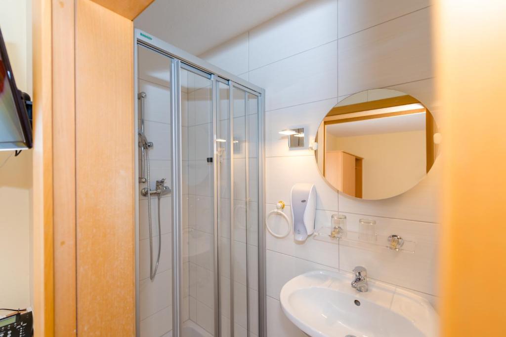 Kúpeľňa v ubytovaní 1a Hotel Steiner