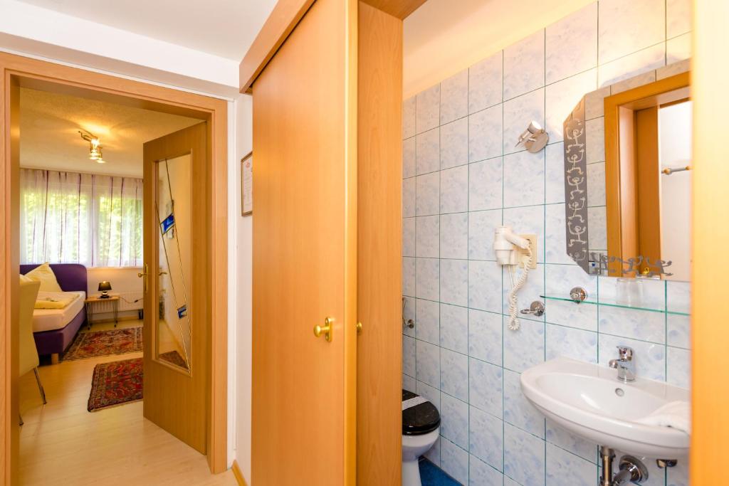 Kúpeľňa v ubytovaní 1a Hotel Steiner