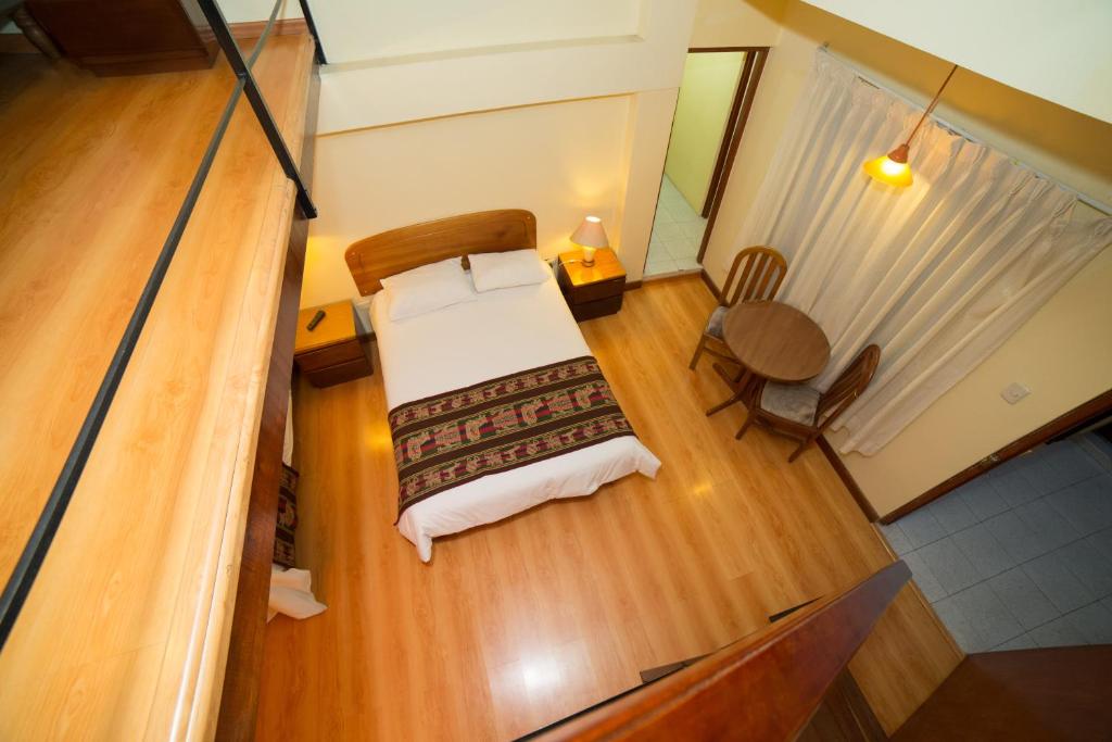 Postel nebo postele na pokoji v ubytování Los Aticos B&B with Coworking