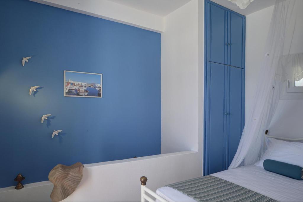Postel nebo postele na pokoji v ubytování Porto Vlastos