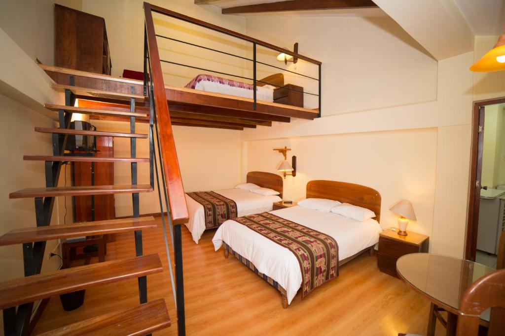 Postel nebo postele na pokoji v ubytování Los Aticos B&B with Coworking
