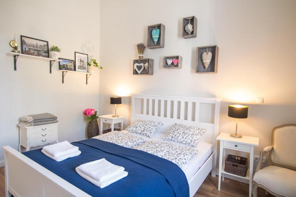 Posteľ alebo postele v izbe v ubytovaní Bródy Apartman