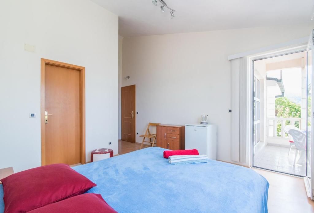 Postel nebo postele na pokoji v ubytování Studio Apartment Brela