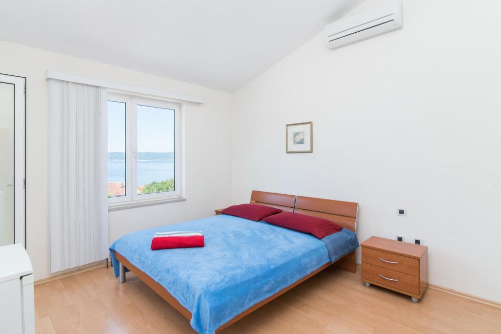 Postel nebo postele na pokoji v ubytování Studio Apartment Brela
