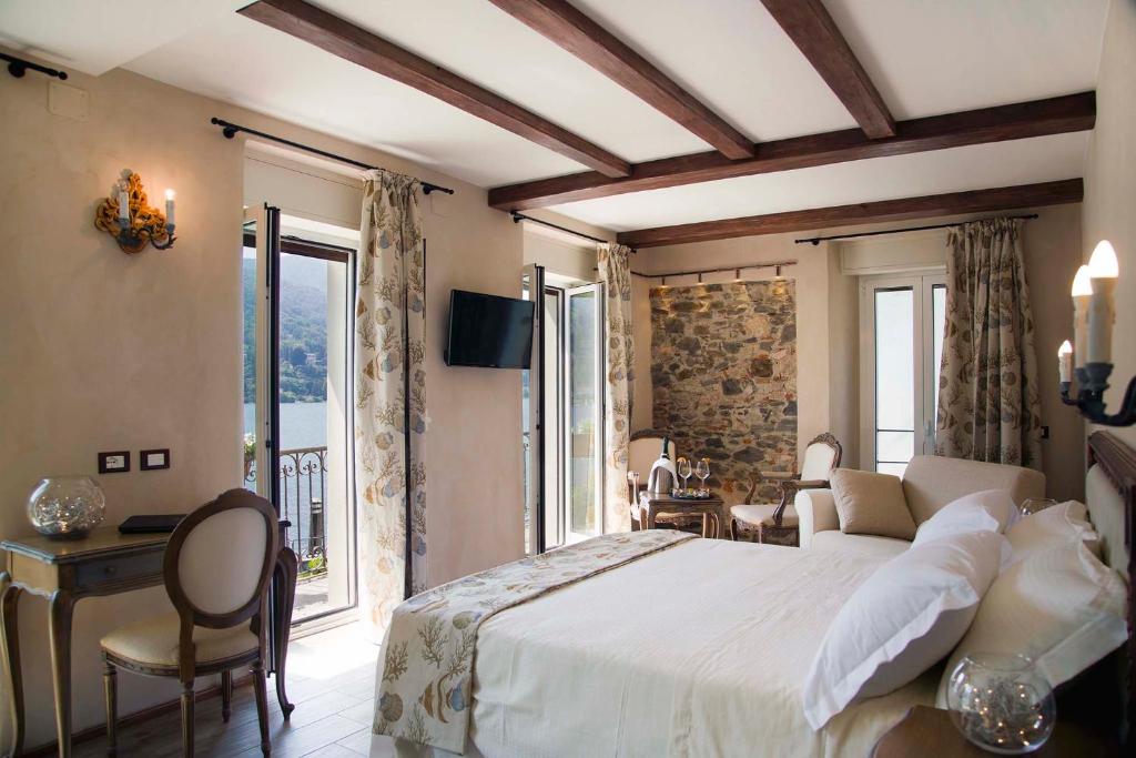 TV a/nebo společenská místnost v ubytování Boutique Hotel Elvezia