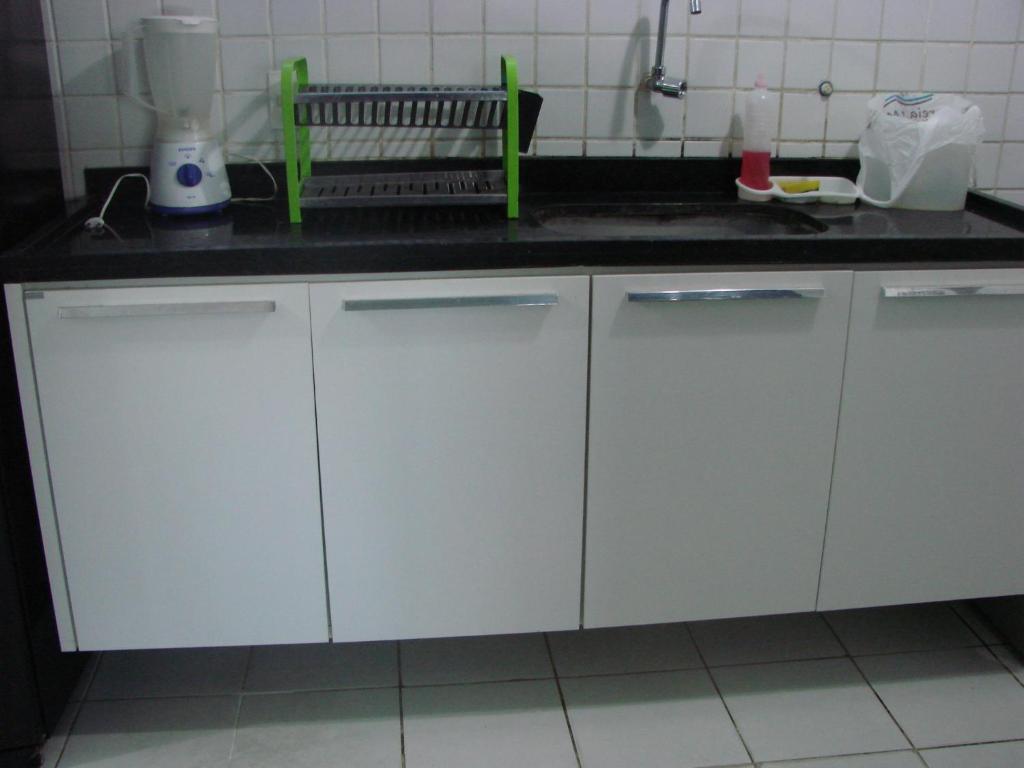  Apartamento em prédio Beira Mar