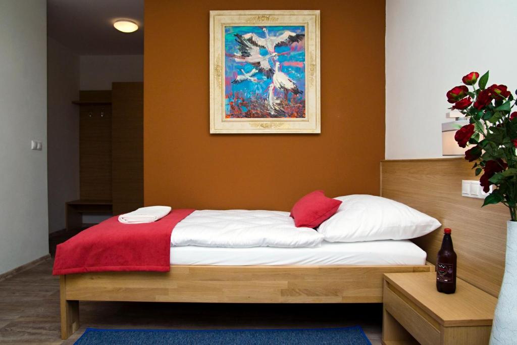 Postel nebo postele na pokoji v ubytování Penzión Minipivovar Tatras