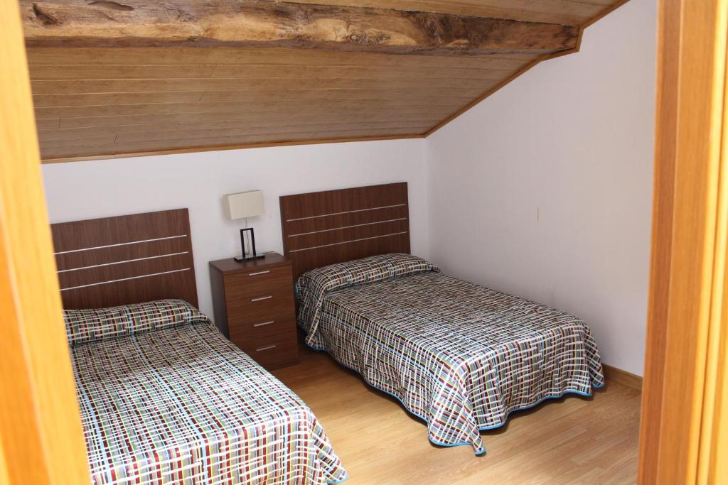 Postel nebo postele na pokoji v ubytování Lazkotzenea