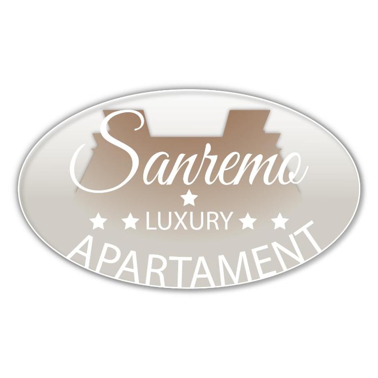 a metal sign that reads santa fe luxury apartments at Sanremo Luxury Apartament in Sanremo
