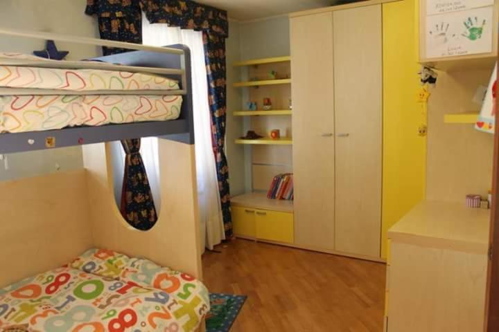 A bed or beds in a room at Casa chanoux