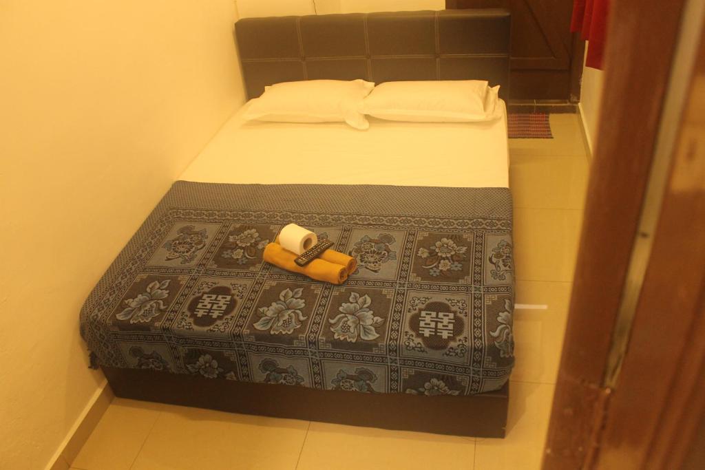 Postel nebo postele na pokoji v ubytování Georgetown Heritage Motel