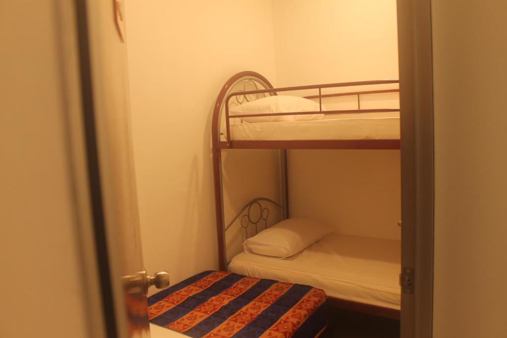 Postel nebo postele na pokoji v ubytování Georgetown Heritage Motel