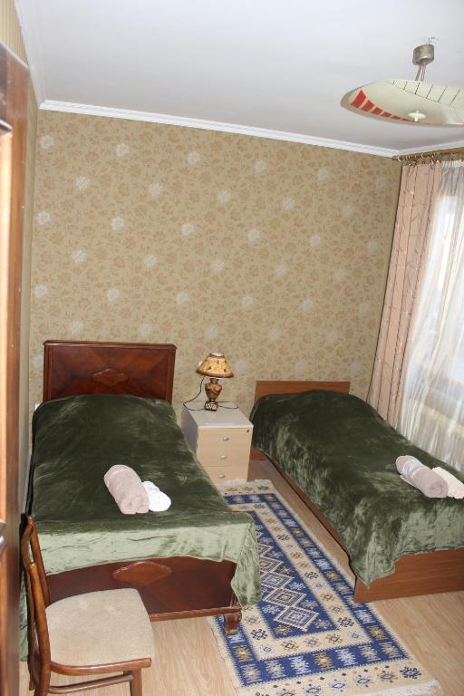 Postel nebo postele na pokoji v ubytování Nunua's Bed and Breakfast