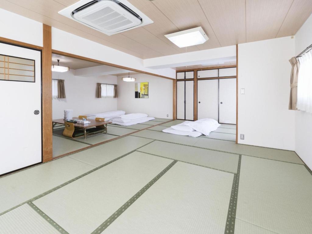 ホテル　港屋にあるベッド