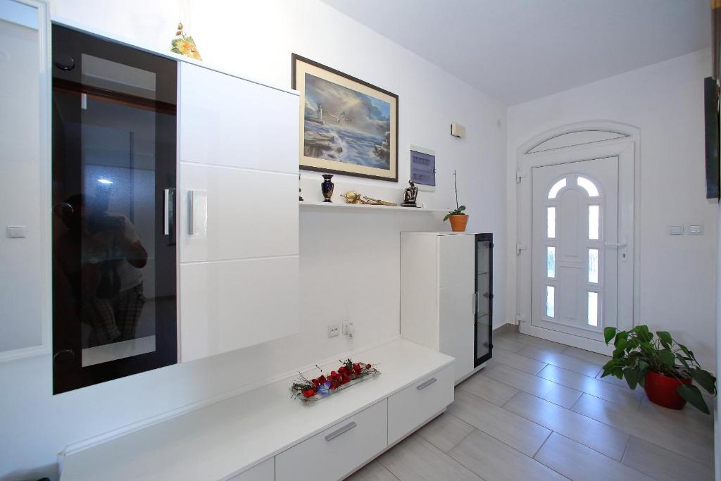 Kuchyň nebo kuchyňský kout v ubytování Apartment Palma
