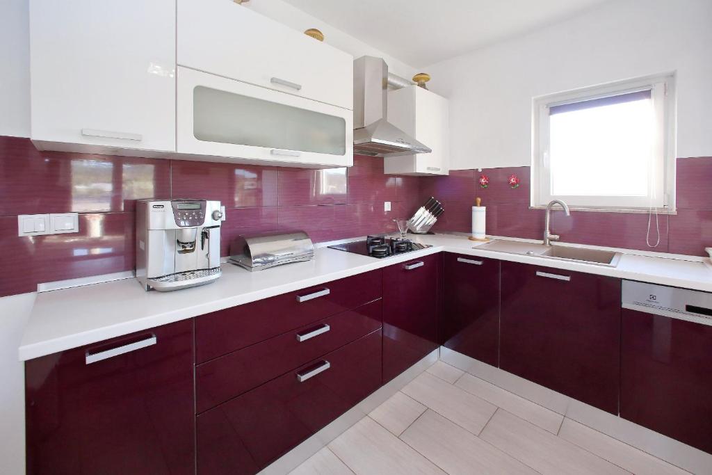 Kuchyň nebo kuchyňský kout v ubytování Apartment Palma