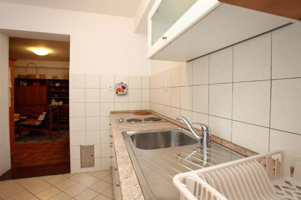 Kuhinja oz. manjša kuhinja v nastanitvi Parenzana Sea View Apartments SK