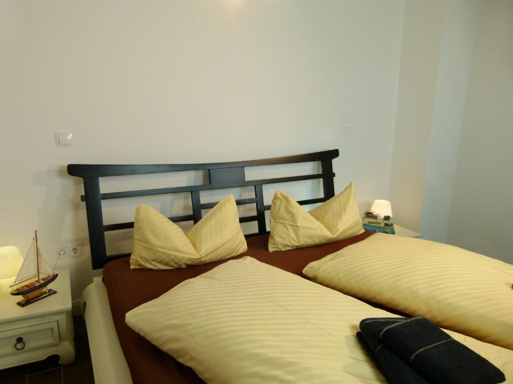 Postel nebo postele na pokoji v ubytování LakeStarnberg Apartments