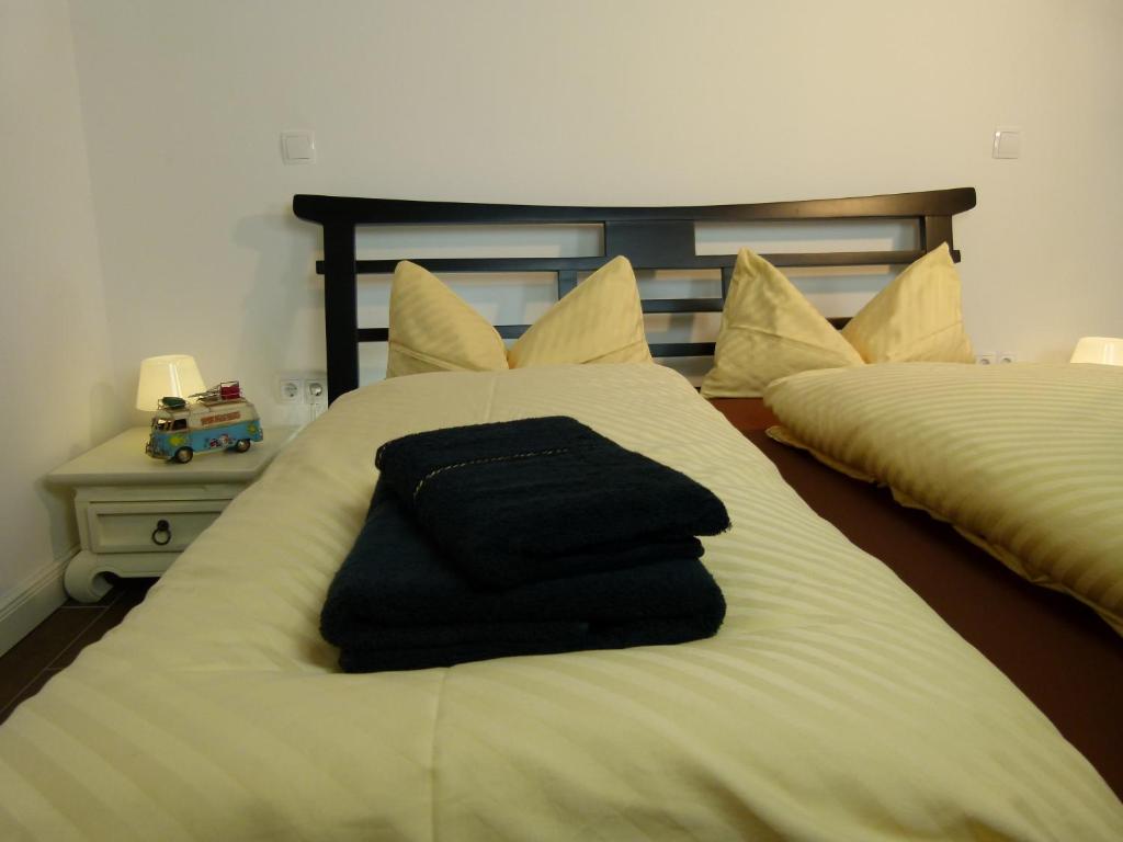 Postel nebo postele na pokoji v ubytování LakeStarnberg Apartments