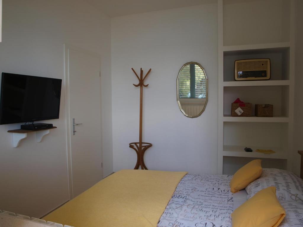 Postel nebo postele na pokoji v ubytování Apartment Buki