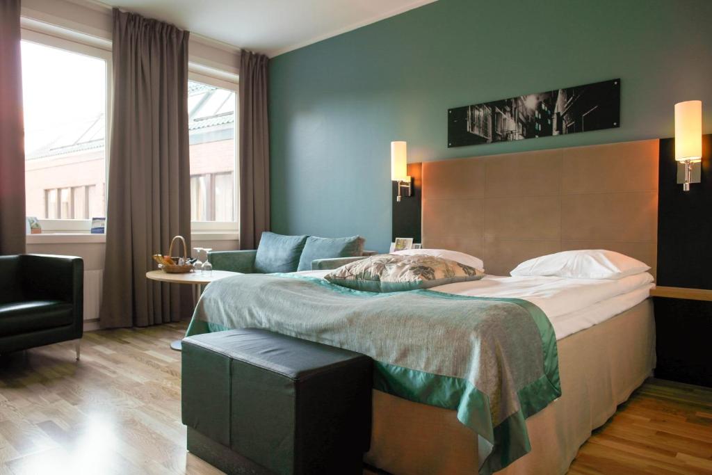 Postel nebo postele na pokoji v ubytování Quality Hotel Augustin