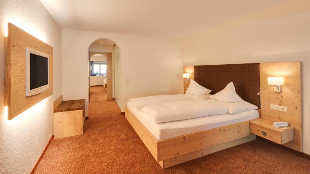 Postel nebo postele na pokoji v ubytování Hotel Nova