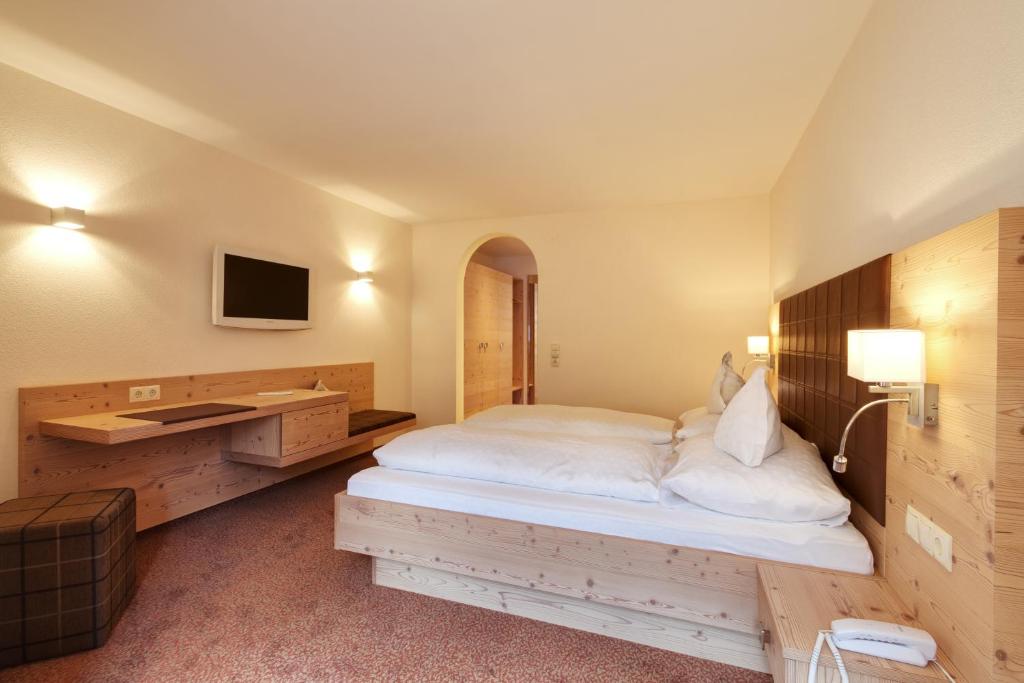 Postel nebo postele na pokoji v ubytování Hotel Nova