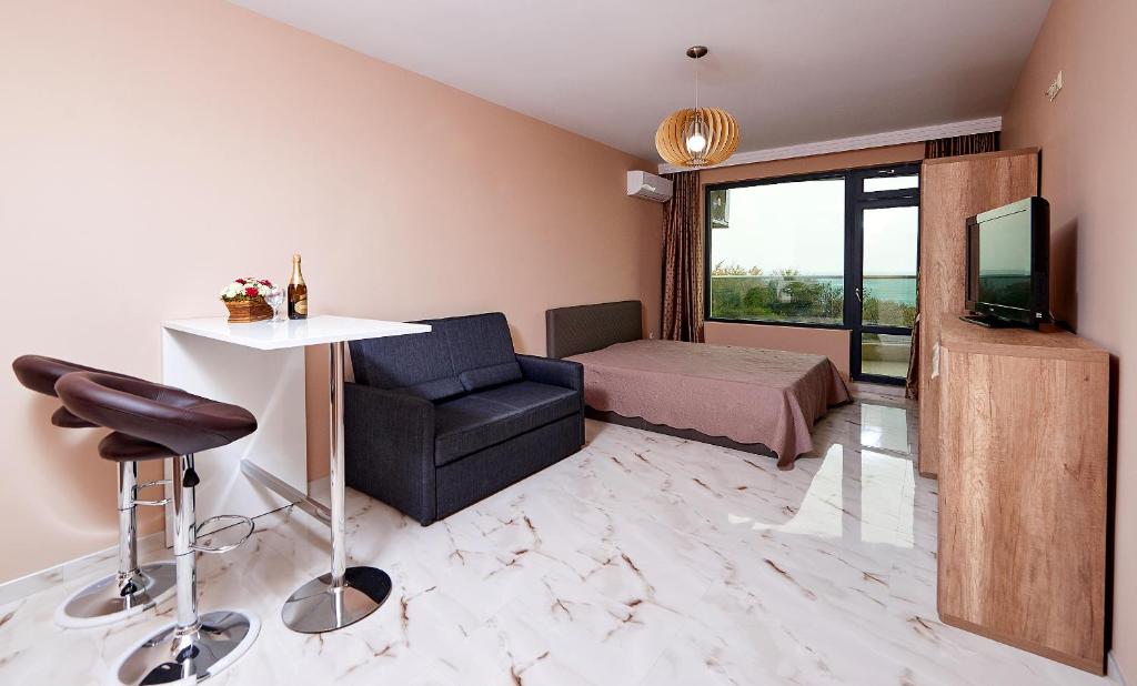 A television and/or entertainment centre at Apartments Magic