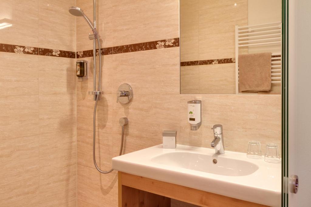 Koupelna v ubytování Hotel Nova