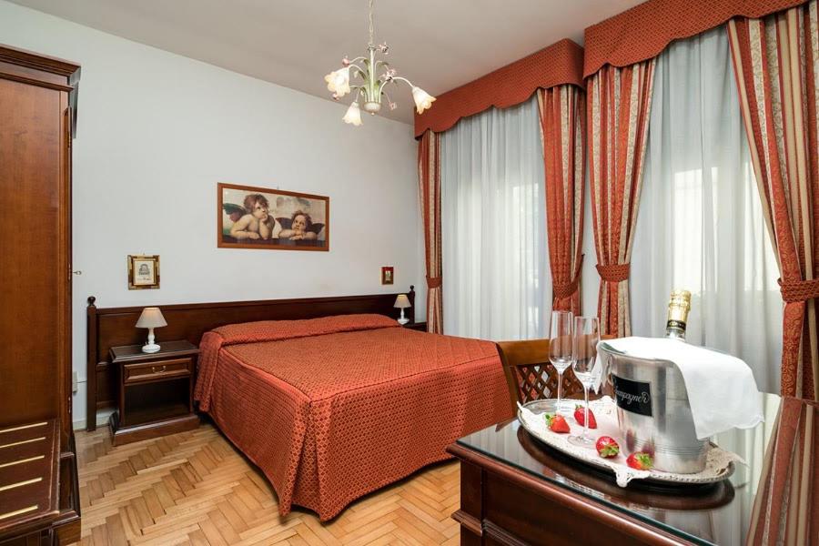 Postel nebo postele na pokoji v ubytování Villa Albertina