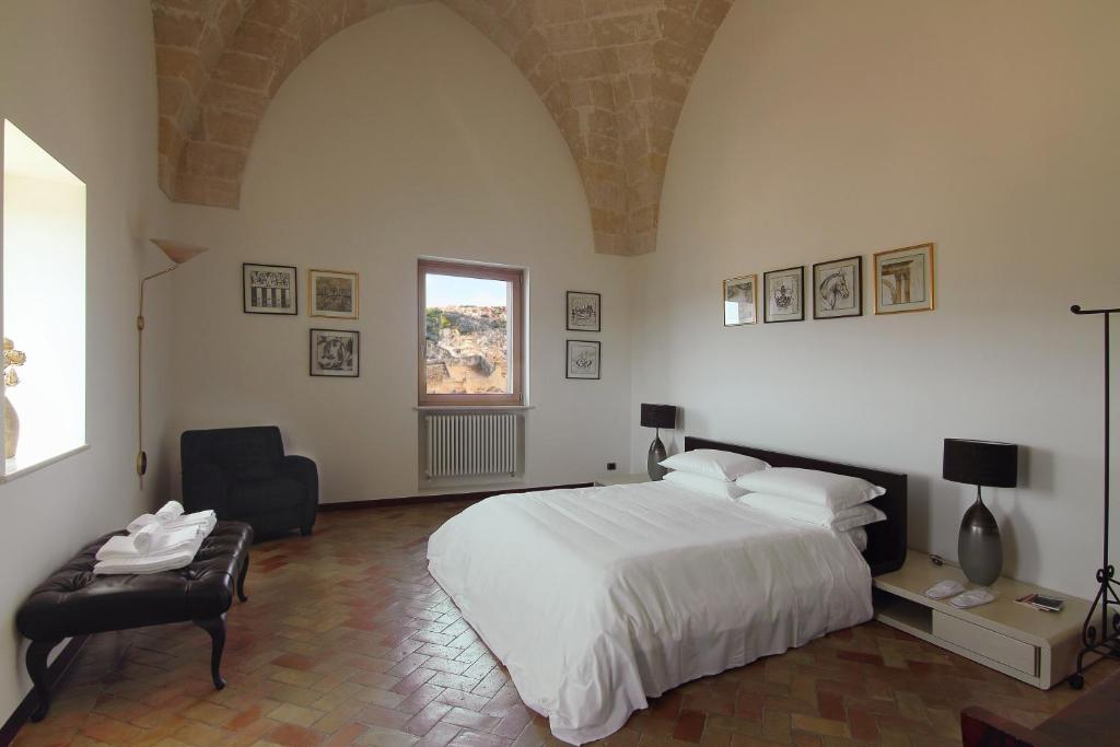Postel nebo postele na pokoji v ubytování Antica Civita Luxury Room