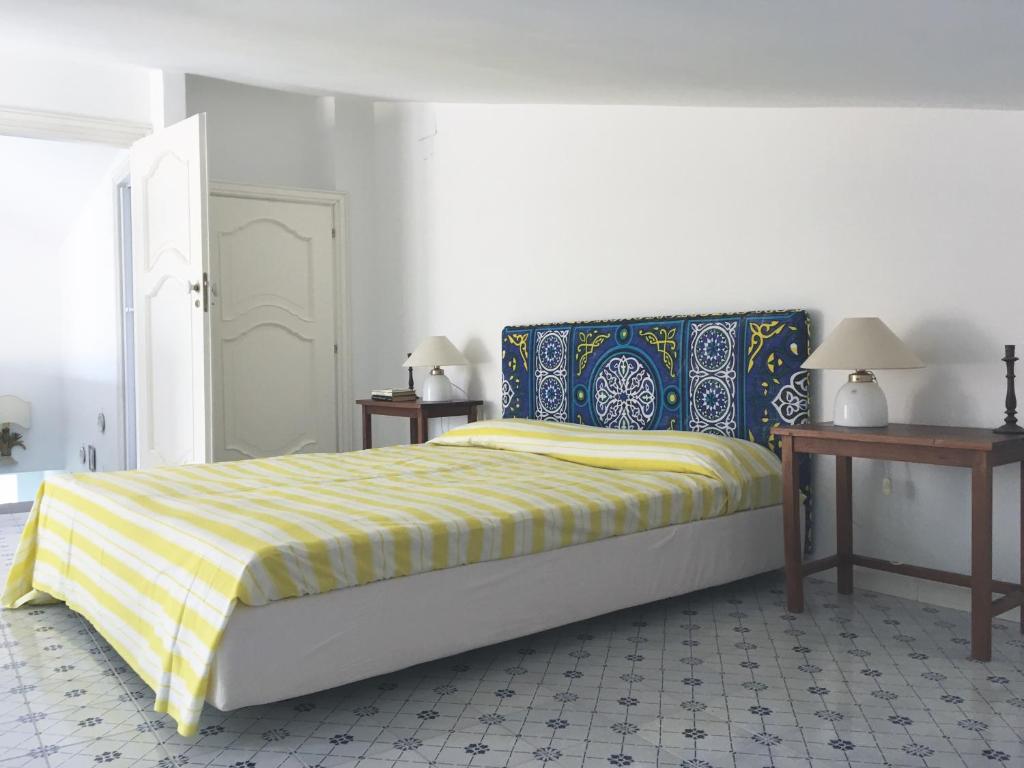 Posteľ alebo postele v izbe v ubytovaní Dimore Santojanni - La Casa sul Porto