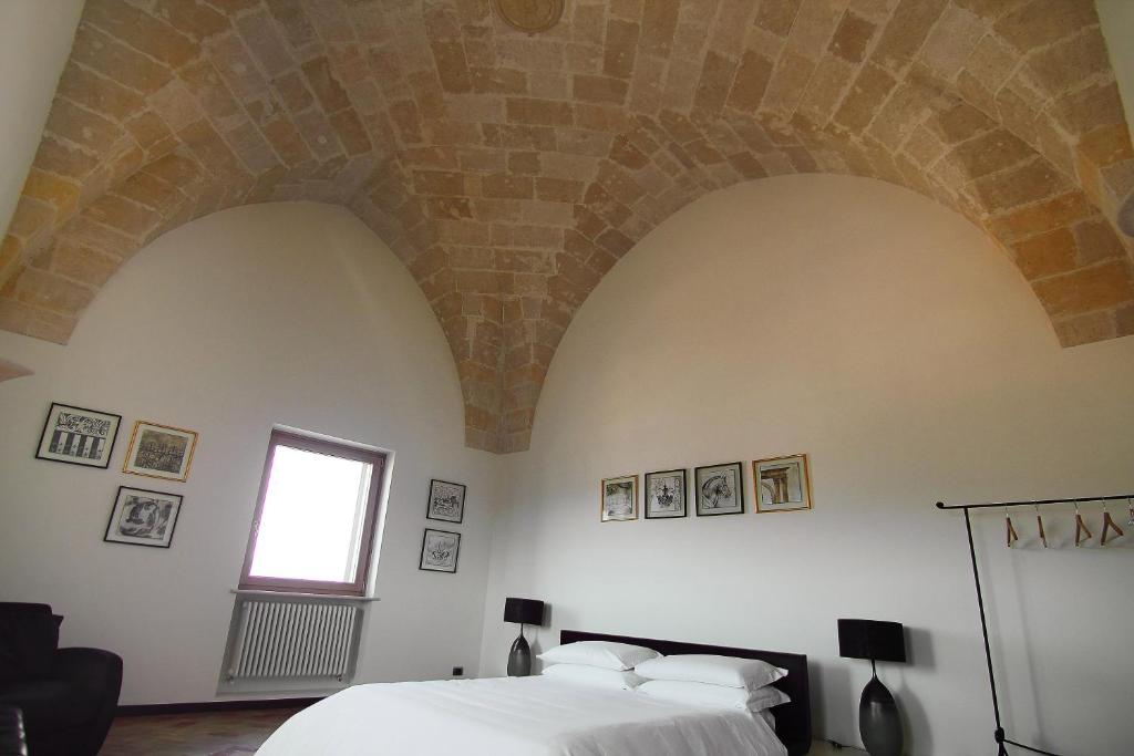 Postel nebo postele na pokoji v ubytování Antica Civita Luxury Room