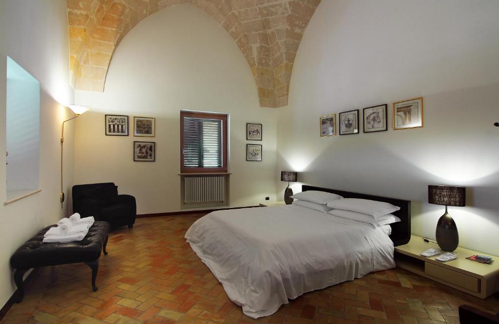 Postel nebo postele na pokoji v ubytování Antica Civita Luxury Room