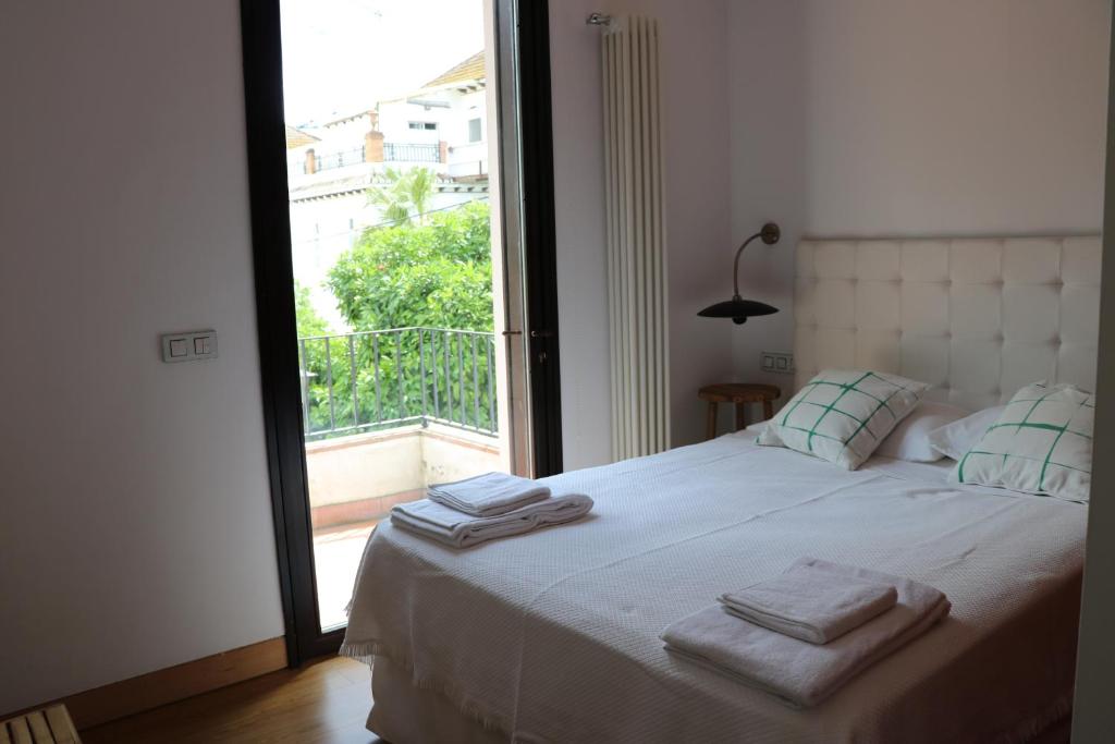Posteľ alebo postele v izbe v ubytovaní la casa de las pergolas