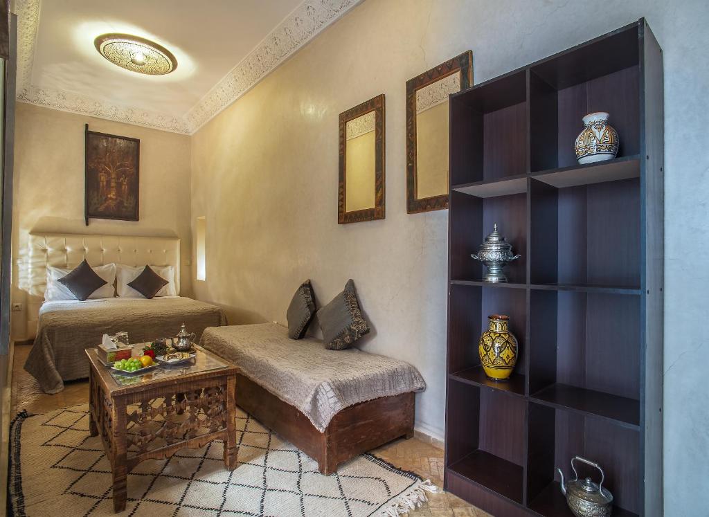 Postel nebo postele na pokoji v ubytování Riad Haraka