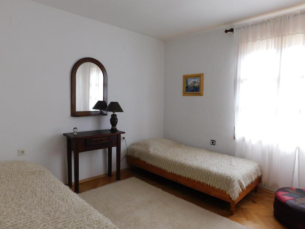 Postel nebo postele na pokoji v ubytování Family Vacation Home Topolnitza