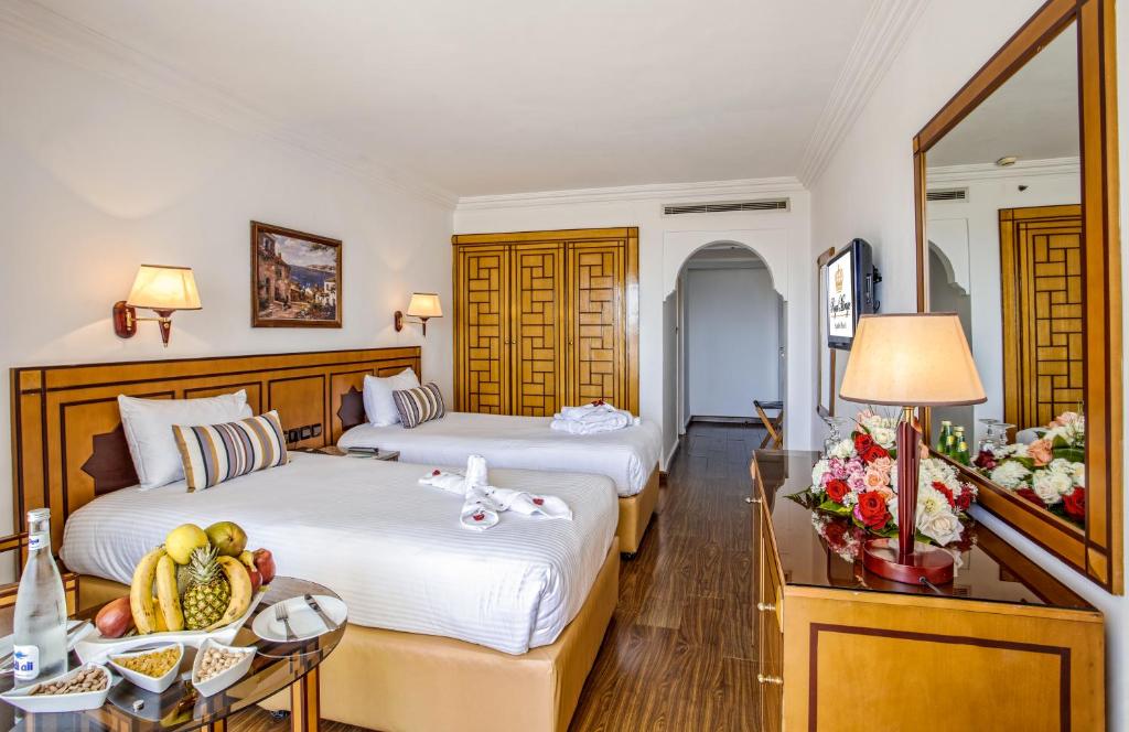 Postel nebo postele na pokoji v ubytování Royal Mirage Agadir