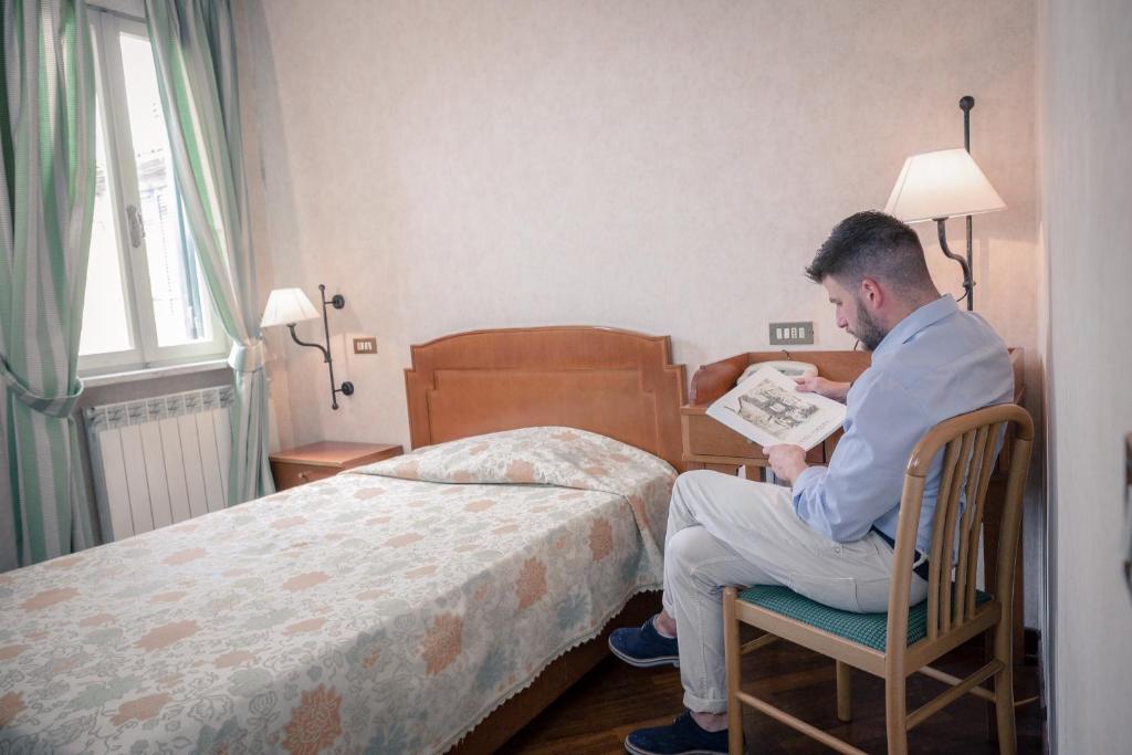 Postel nebo postele na pokoji v ubytování Hotel Fortuna