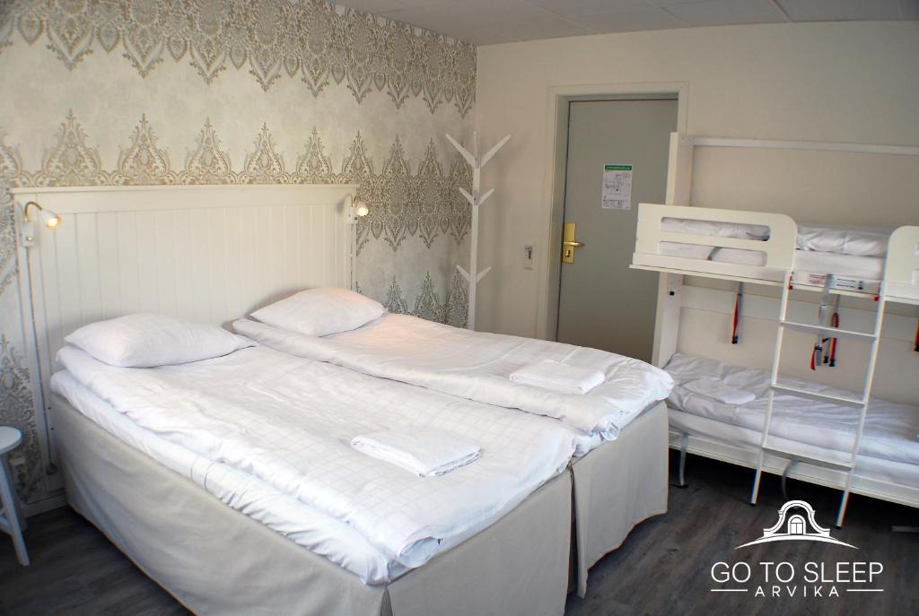 Postel nebo postele na pokoji v ubytování Go to sleep Arvika