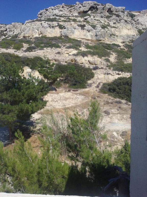 a view of a mountain from the side of a building at Villa Sylvia in Matala