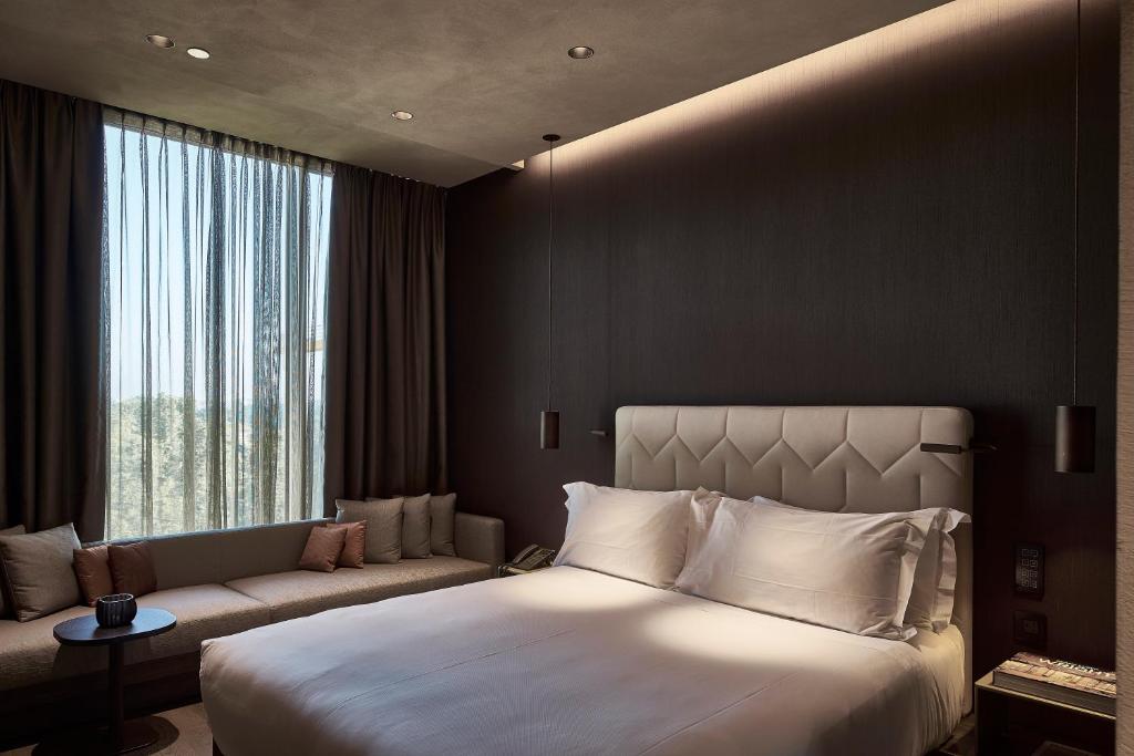 Postel nebo postele na pokoji v ubytování Hotel VIU Milan, a Member of Design Hotels