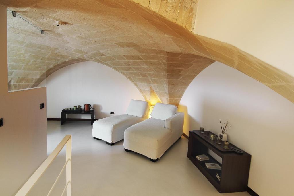 Postel nebo postele na pokoji v ubytování Antica Civita Luxury Room