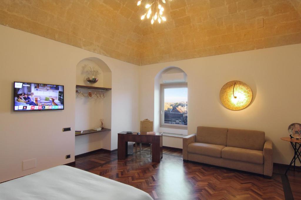 TV a/nebo společenská místnost v ubytování Antica Civita Luxury Room