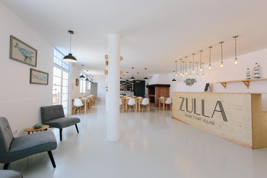 TV a/nebo společenská místnost v ubytování Zulla Nazaré`s Surf Village