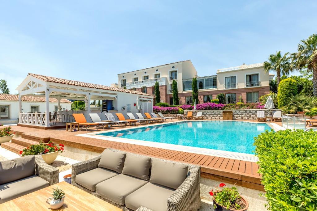 an image of a swimming pool at a hotel at Antmare Hotel in Alaçatı