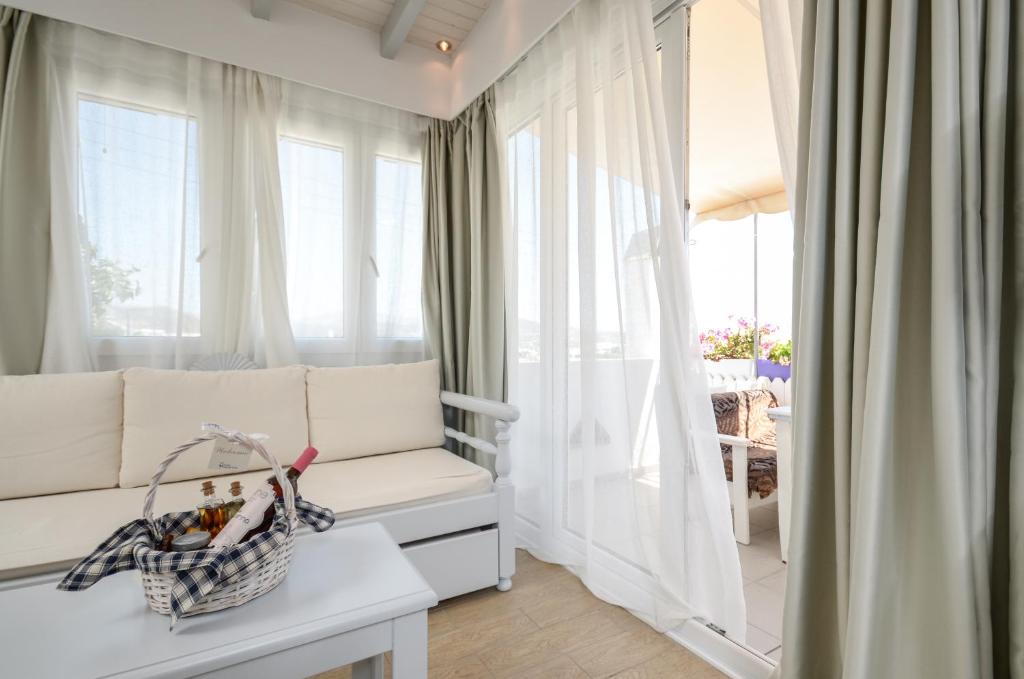 Postel nebo postele na pokoji v ubytování Santa Katerina Apartments & Studios