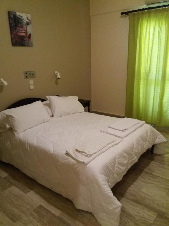 Postel nebo postele na pokoji v ubytování Rastoni